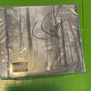 Taylor Swift signed Folklore album with rare Dorito heart